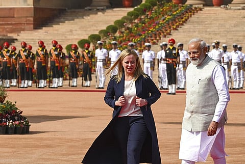 Italian Premier Giorgia Meloni, left, is received by Indian Prime Minister Narendra Modi, as she arrives for a ceremonial reception at the Indian Presidential Palace in New Delhi (Photo | AP)