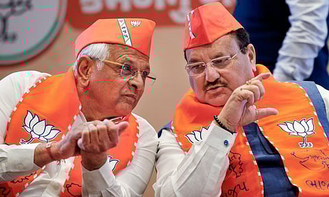 A file photo of Gujarat Chief Minister Bhupendra Patel (L) and BJP National President JP Nadda during a party event in Gandhinagar. (Photo | PTI)