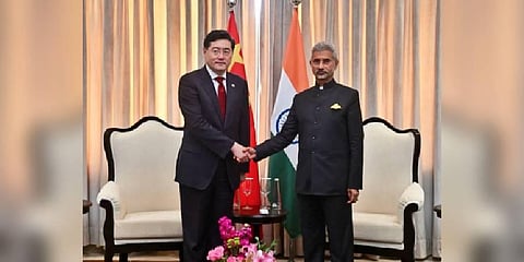 External Affairs Minister S Jaishankar with his Chinese counterpart Qin Gang at G20 meeting. (Photo | Twitter)