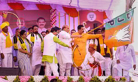 Defence Minister and senior BJP leader Rajnath Singh with Prahlad Joshi, Karnataka BJP President Nalin Kumar Kateel and other party leaders during the 'Vijay Sankalp Yatra', at Nandgad. (PTI)