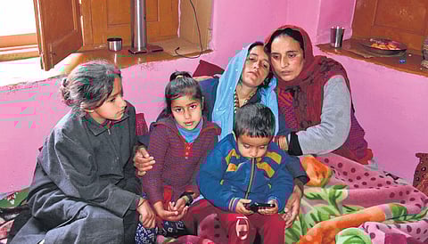 Family members of Sanjay Sharma, who was shot dead by militants on Sunday in Achan village in Pulwama, urged the government to provide them accommodation in Jammu, on Wednesday  | Zahoor punjabi