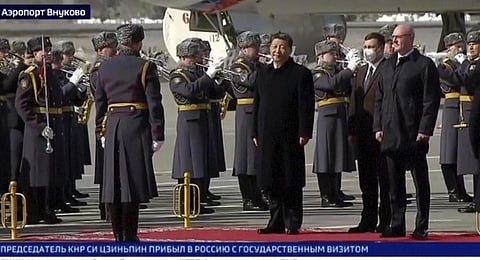 In this grab taken from video provided by RU-24, China's President Xi Jinping stands, during an official welcome ceremony upon his arrival in Moscow on Monday, March 20. (Photo | AP)