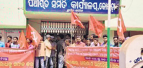 CPM workers staging protest outside Koida block office on Monday | Express