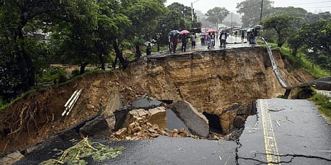 A road connecting the two cities of Blantyre and Lilongwe is seen damaged following heavy rains caused by Tropical Cyclone Freddy in Blantyre, Malawi. (Photo | AP)