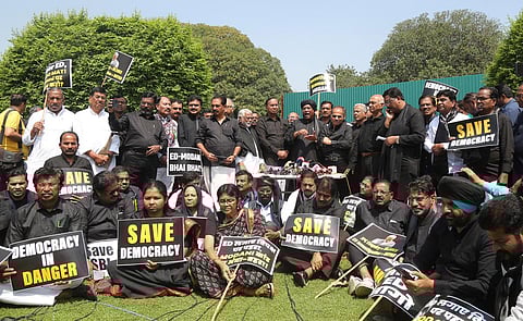 Congress President and Leader of Opposition in Rajya Sabha Mallikarjun Kharge with fellow opposition MPs address the media after a protest march over the Adani Group issue, at Vijay Chowk. (Photo | Parveen Negi, EPS)
