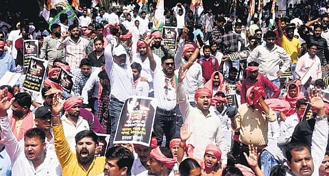 IYC activists staging a protest against Rahul Gandhi’s disqualification from Lok Sabha, at Jantar Mantar on Monday | Parveen Negi