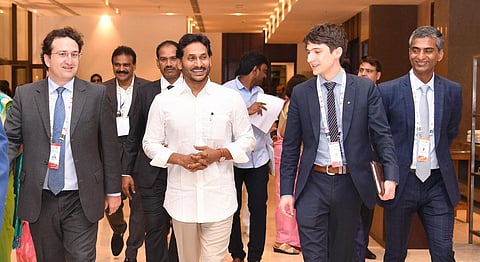 CM Jagan arriving at the venue of the G20 meet in the Port City on Tuesday. He landed at Vizag airport at 7pm, hours behind schedule as his flight reportedly developed a snag | Express