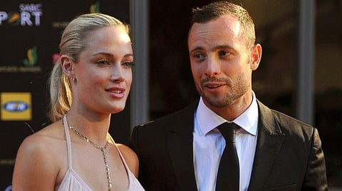 South African Paralympic champion Oscar Pistorius with his then girlfriend, Reeva Steenkamp. (Photo | AFP)