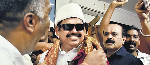 EPS dons MGR-style specs and cap at the AIADMK headquarters | P Jawahar