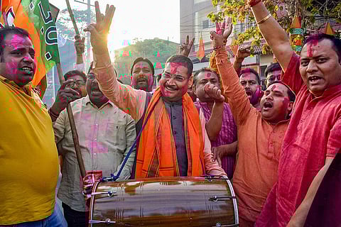 Jharkhand BJP President and Rajya Sabha MP Deepak Prakash beats a 'dhol' to celebrate the party's victory in Tripura, Nagaland Assembly polls and Ramgarh bypoll, in Ranchi. (Photo | PTI)