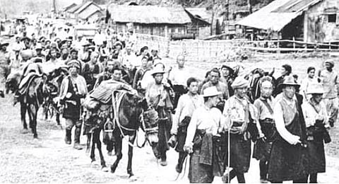 Tibetan refugees arrive at the Indian border during the exodus of 1959