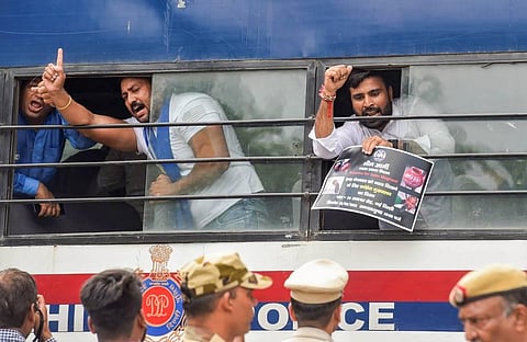 Bhim Army activists being detained by security personnel during their protest over the Jalore (Rajasthan) incident, wherein a 9-year-old Dalit student was allegedly beaten to death. (File Photo | PTI)