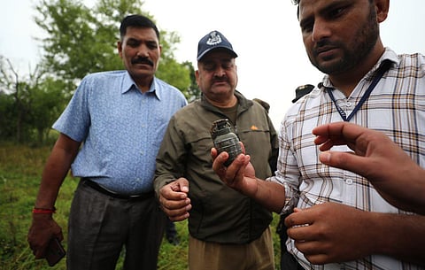 A live grenade was found during a search operation in Sanyal village near the International Border in the Kathua district, Thursday, March 30, 2023. (Photo | PTI)