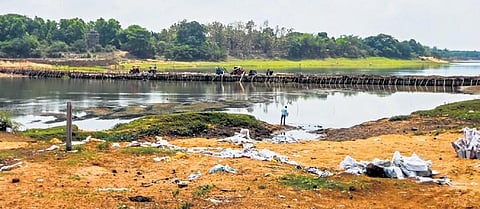 Pumps dewatering a watertight enclosure created for barrage on Kuakhai river near Hi-Tech Hospital in Bhubaneswar | DEBADATTA MALLICK