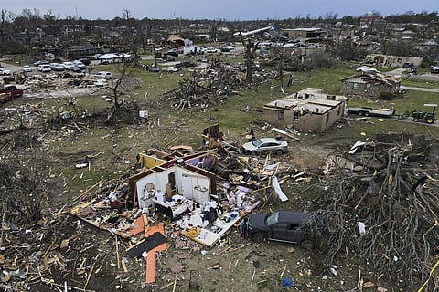 Debris is strewn about tornado-damaged homes on Sunday, March 26, 2023, in Rolling Fork, Mississippi. (Photo | AP)