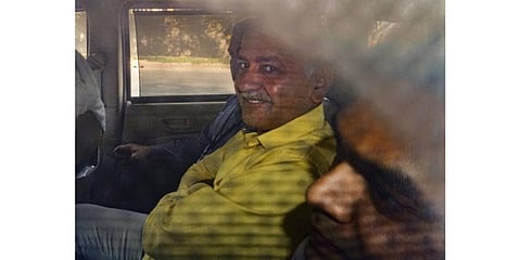 Delhi Deputy Chief Minister Manish Sisodia is being taken to Rouse Avenue Court by CBI officials in the excise policy case, in New Delhi, Monday, Feb. 27, 2023. (Photo | PTI)