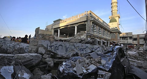 January 2023: In this representational image, people visit the site of suicide bombing after authorities finished the rescue operation, in Peshawar, Pakistan. (File Photo | AP)