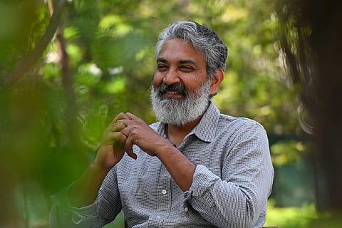 Indian filmmaker SS Rajamouli gestures during an interview with AFP in Hyderabad, Feb. 22, 2023. (Photo | AFP)