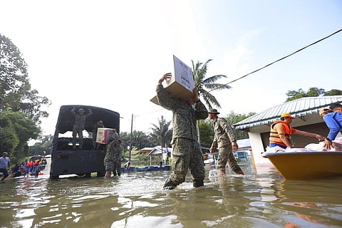 Army transporting aids at Lengga town in Johor state, Malaysia, Tuesday, March 7, 2023. (Photo | AP)