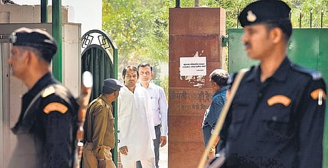 Tej Pratap, son of former Bihar chief minister Rabri Devi, at her residence when CBI officials were questioning her in the land-for-jobs scam, in Patna on Monday. (Photo | PTI)