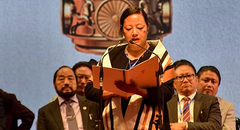 NDPP leader Salhoutuonuo Kruse takes oath as a Nagaland Cabinet Minister, at a ceremony in Kohima, Tuesday, March 7, 2023. (Photo | PTI)
