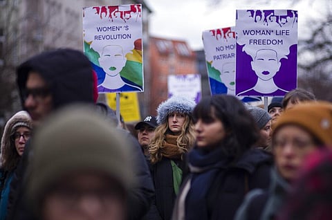 Protestors attend a rally in support to the women of Iran and Afghanistan on the International Women's Day 2023 in Berlin, Germany, Wednesday, March 8, 2023. (Photo | AP)