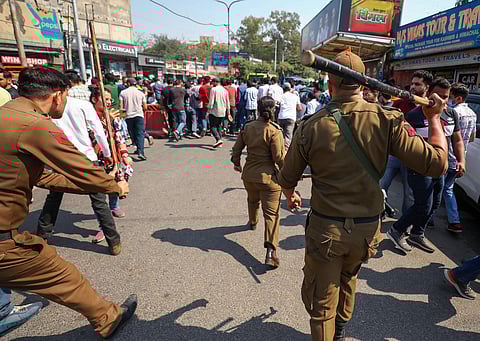 Police lathi-charge to disperse JKSSB aspirants protesting against purported grant of contract to APTECH Limited for conduct of various examinations for government jobs, March 8, 2023. (Photo | PTI)