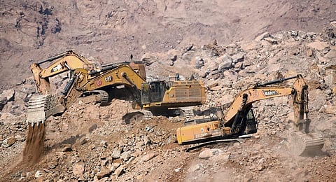 Photo released by China's Xinhua News Agency, rescuers with heavy equipment work at the site of a collapsed open pit coal mine in Alxa Banner in northern China.(File | AP)