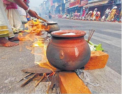 ​  Devotees offering Attukal pongala at Thampanoor in Thiruvananthapuram on Tuesday | B P Deepu  ​