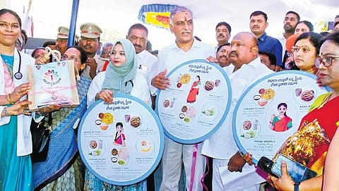 Ministers T Harish Rao and Gangula Kamalakar during the launch of Aarogya Mahila programme at an Urban Primary Health Centre (UPHC) in Karimnagar on Wednesday