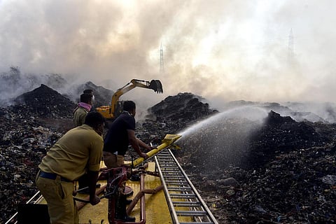 File photo of firefighting operations being carried out at Brahmapuram waste treatment plant in Kochi. (Photo | A Sanesh, EPS)