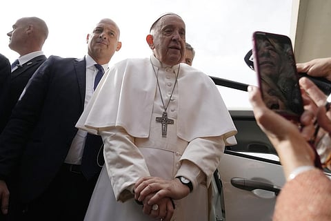 Pope Francis talks with journalists as he leaves the Agostino Gemelli University Hospital in Rome on Saturday, April 1, 2023. (Photo | AP)