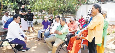 Higher Education Minister Dr CN Ashwath Narayan interacts with residents of Malleshwaram on Sunday