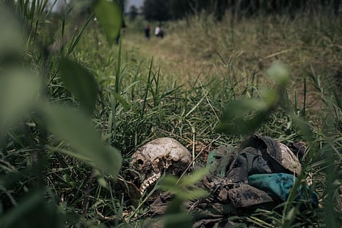 A corpse lies on the side of a path in Kishishe, eastern Democratic Republic of Congo, on April 5, 2023. (Photo | AFP)