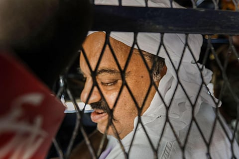Gangster-turned-politician Atiq Ahmad being brought from Sabarmati Central Jail to present again before a Prayagraj court in the Umesh Pal murder case, in Ahmedabad,  April 11, 2023. (Photo | PTI)