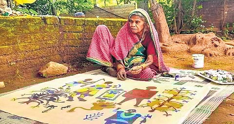 Jodhaiya Bai Baiga is a labourer-turned-Padma Shri awardee painter. (Photo | PTI)