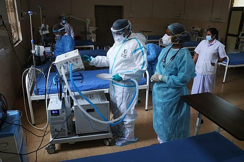 Health workers wearing personal protective equipment take part in a mock drill at a government chest clinic in Puducherry on Tuesday. (Photo | Sriram R, EPS)
