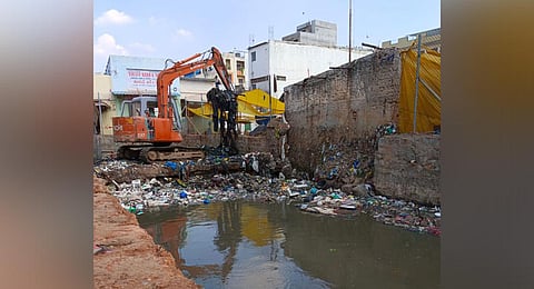Desilting of Afzalsagar nala in progress.