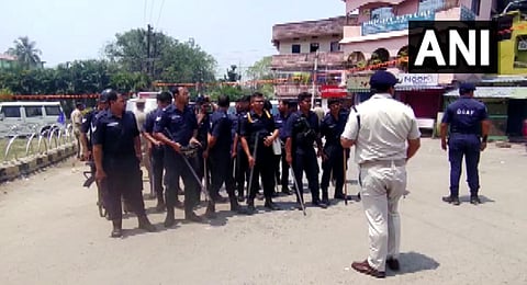Security personnel before a flag march in Odisha's Sambalpur.(Photo | ANI Twitter)