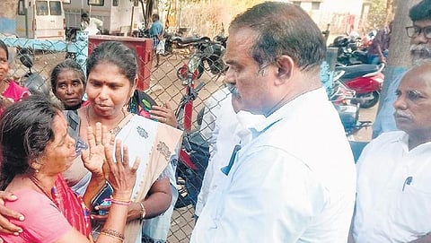 TNUEF state general secretary K Samuel Raj and CPM cadre with the victim’s family members at Salem GH on Sunday  | Express