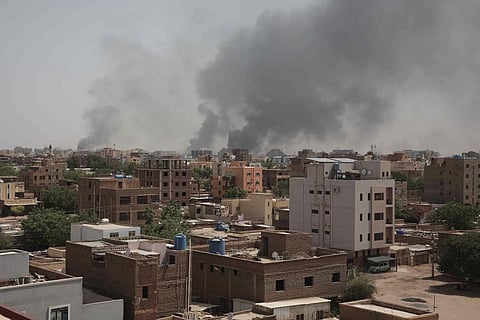 Smoke rises from a central neighborhood of Khartoum, Sudan, Sunday, April 16, 2023, after dozens have been killed in two days of intense fighting. (Photo | AP)