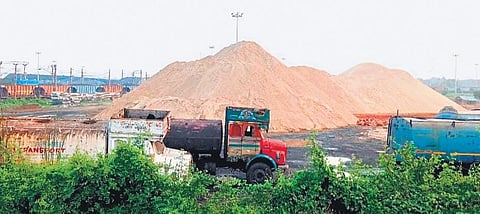 Huge mounds of sand piled on the premises of Paradip Port I Express
