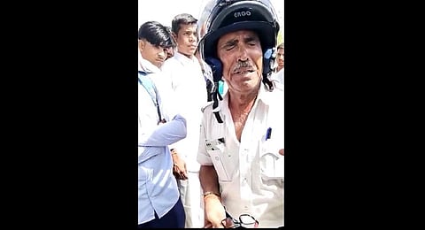 A traffic constable in Rajasthan was seen sobbing in a viral video. (Photo | ANI Twitter)