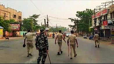 Security personnel during a curfew imposed after the incident of fresh violence on the occasion of Hanuman Jayanti, in Sambalpur on April 15, 2023. (Photo | PTI)
