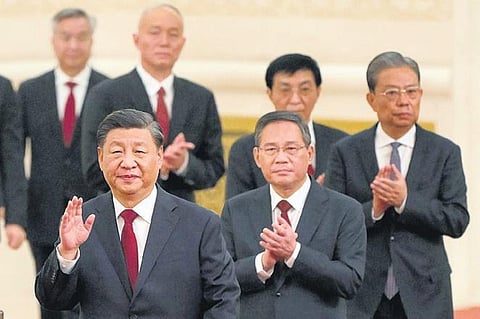 A file photo of China's paramount leader Xi Jinping with premier Li Qiang and other CCP leaders, used for representative purposes only. (Photo | AFP)