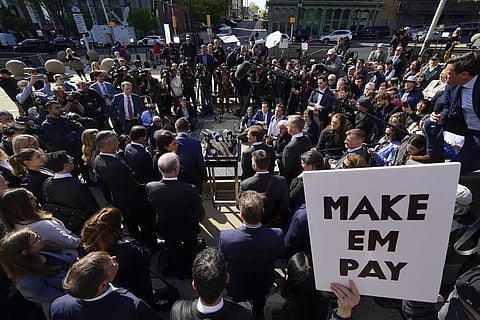Attorneys for Dominion Voting Systems speak at a news conference outside New Castle County Courthouse in Wilmington, Del., April 18, 2023. (Photo | AP)