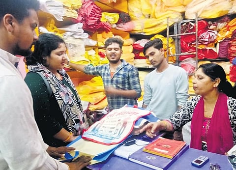A team of around 15 volunteers collect, sort and arrange the items.