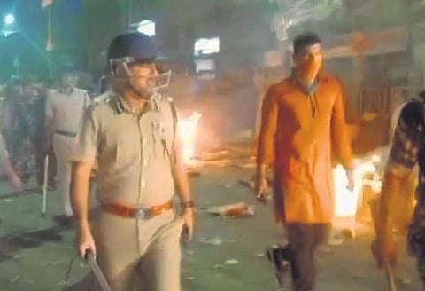 Several vehicles  were torched during the clash in Howrah on Friday | express