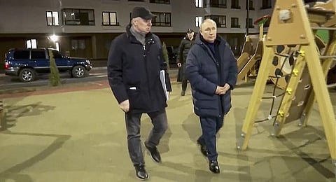 FILE: In this photo taken from video released by Russian TV Pool, Russian President Vladimir Putin (R) visits Mariupol in Russian-controlled Donetsk region in Ukraine. (Photo | AP)