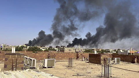 Smoke fills the sky in Khartoum, Sudan, near Doha International Hospital on Friday, April 21, 2023.  (Photo | AP)